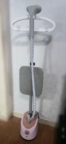 Steam ironing machine