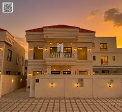 Directly opposite the park is a luxurious villa with a classic design and very high-end, elegant fin