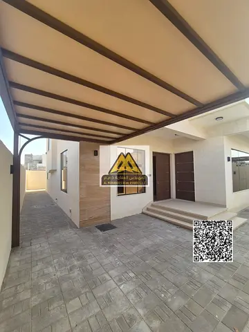 A distinctive villa in Al Zahiyah, Ajman, with high-end custom finishing, water and electricity included, and utilities guaranteed.