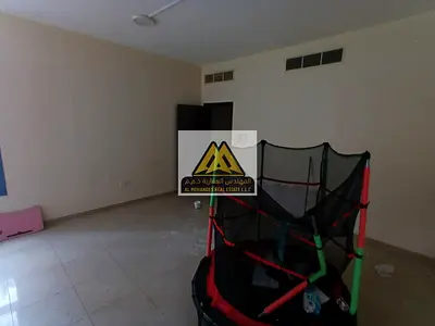 Apartment in Al Nuaimiya Towers, 2 bedrooms and living room, large space, 2 bathrooms, 2 balconies, maid’s room, maintenance by owner, AED 40,000 year