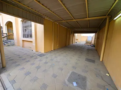 Villa in Al Yasmin, Ajman - Four bedrooms - Two living rooms - Maid's room - Large storage room for the kitchen