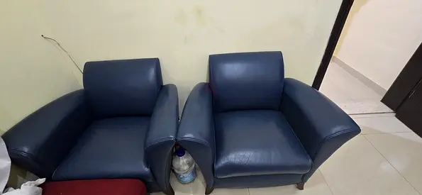 Pair of navy blue leather sofas — very good condition