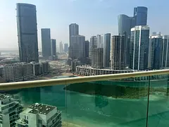 Beach Tower Reem Island - Natural Wood Floor.