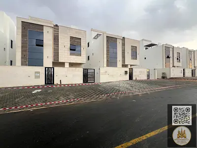 Villa for sale in Al-Haliyo 2, distinctive modern design, two floors with a spacious roof, quiet location close to services. Price includes registrati