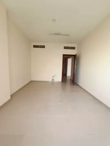 A well-located apartment is available for annual rent in Al Majaz 2 on Al Wahda Street, in a lively