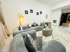 Two-bedroom furnished VIP apartment with a living room, first occupancy, in Al Nuaimiya 1