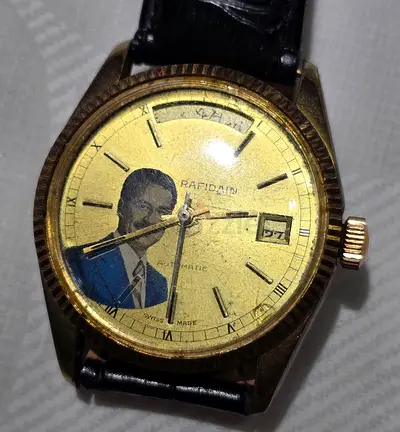 Vintage watches,with saddam picture.