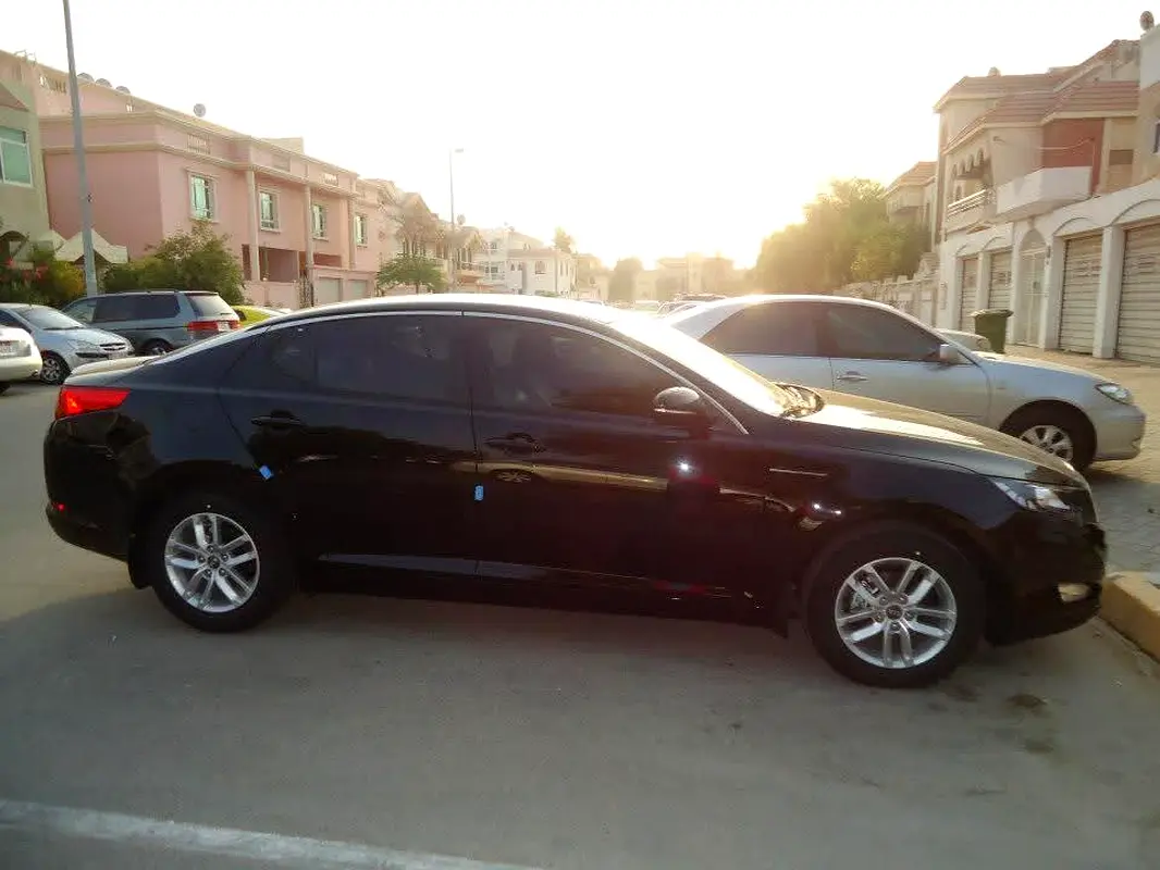 Kia Optima 2013 — photo 1 of 4