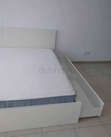 IKEA Malm King Size storage bed frame with IKEA brand mattress for sale in good condition