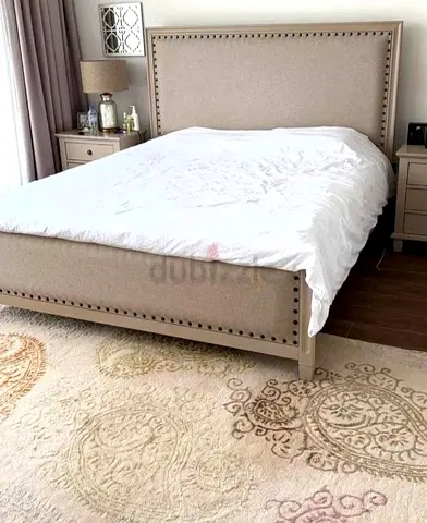 Available high quality bed with tow side table and dressing table like a new
