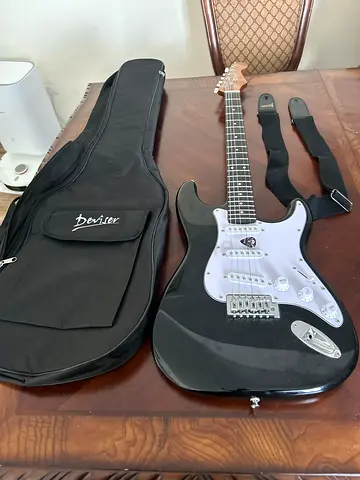 Electric guitar with bag, chord, strap and pic
