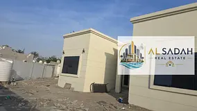 Two adjacent houses for sale in Al-Talaa, each with its own electricity meter. The first house has 5