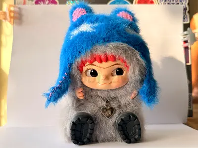 Plush Grey Furry Monster Toy with Blue Hat and Heart Charm