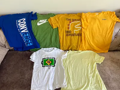 Lot of 7 casual boys t-shirts — assorted brands and sizes8-9 years very good condition.