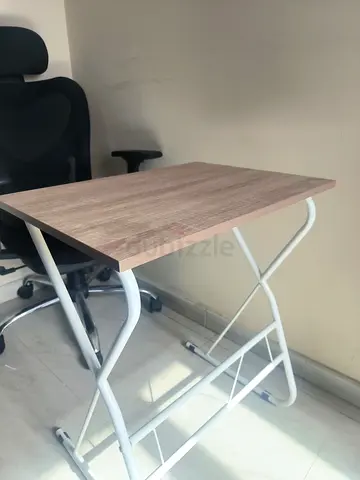 Compact foldable study table with wood top and white metal legs