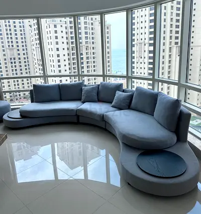 Modern Curved Sofa with Ottoman – Excellent Condition