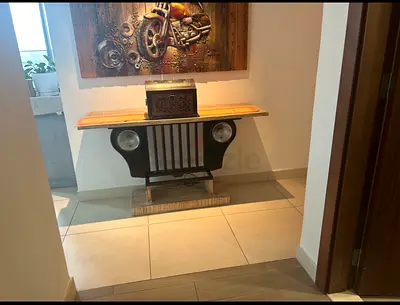 Rustic Console Table with Decorative Metal Accents
