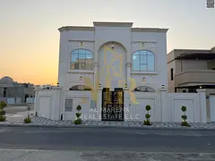 Villa for sale in Al Alia, Ajman, corner unit on the main road, price includes electricity, water an