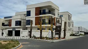 Own a corner villa with two floors and a roof terrace, featuring 7 master bedrooms, at a price that