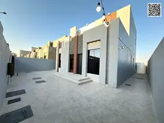 Luxury villa for sale, two floors + rooftop, with a modern design and spacious areas, featuring a la