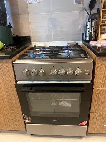 Haier Stainless Steel Gas Cooker with Oven - 5 Burners, Good Condition