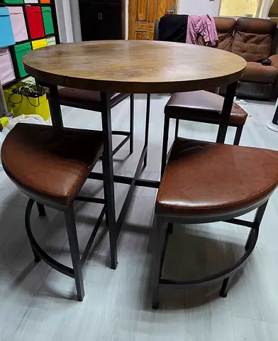 Round wooden high dining table with 4 curved stools