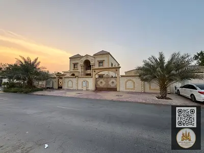 Luxury villa for sale on a 9,000 sq ft plot, with a 5,500 sq ft built-up area. It features 7 master bedrooms, 2 majlis (formal sitting rooms), a spaci
