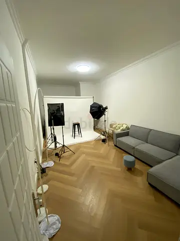 Small Home Photo Studio Setup with Backdrop and Lights