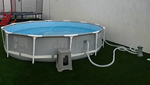 Used Round Above-Ground Plastik Frame Swimming Pool - Intex
