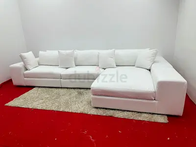 Like new condition eichholtz brand lshape sofa