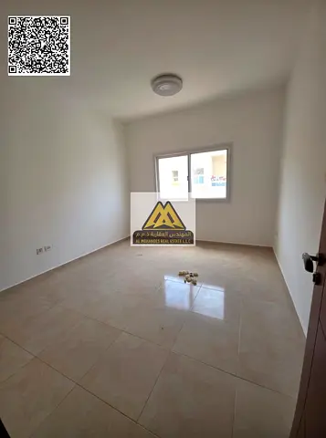 A great opportunity for annual rent in Al Jurf 2 – Ajman. A spacious 2-bedroom apartment with a liv