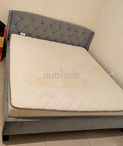 Grey double bed with semi orto mattress