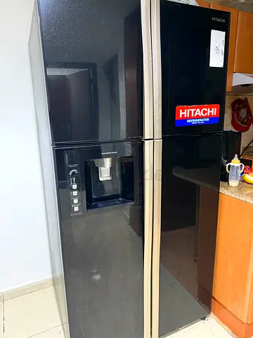 Hitachi side-by-side refrigerator with water dispenser - black