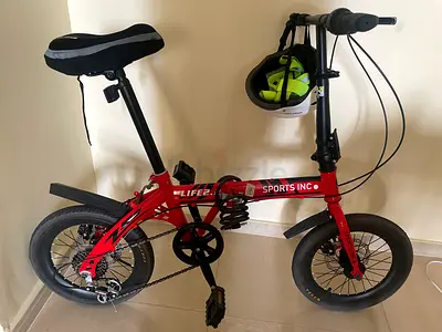 Compact Foldable Red Mini Bike - Great for City Commute