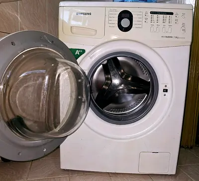 Samsung front load washing machine 7kg - good working condition, little sound while working