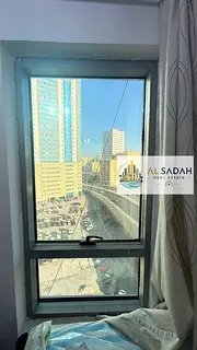 Apartments for sale in Capital Tower, Al Majaz 2. Two bedrooms, living room, kitchen, three bathroom