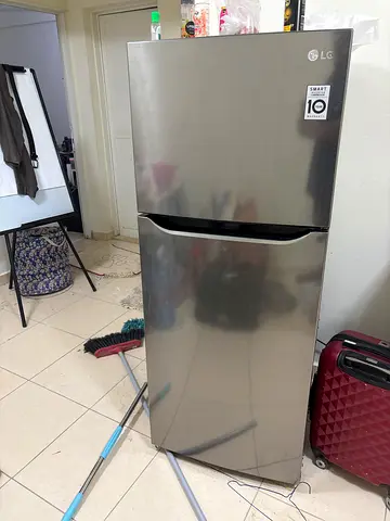 LG Stainless Steel Top-Freezer Refrigerator - Excellent Condition -8 years warranty remaining.