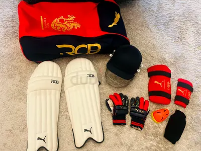 RCB Puma Cricket Kit — Batting Pads, Gloves, Helmet, Guards  Bag (Used, Very Good Condition)