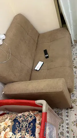 Two-seater beige fabric sofa - good condition