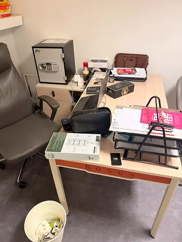 Grey Ergonomic Office Chair with Armrests and Wheels