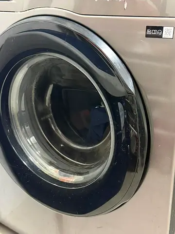 Front-load washing machine - silver, good working condition