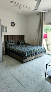 NICE FAMILY FURNISHED ROOM WITH ATTACHED BATHROOM, KITCHEN  OPEN BACKYARD IN ABU HAIL. AED: 2300/-