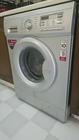 LG Front Load Washing Machine 7kg - Silver, Good Working Condition.