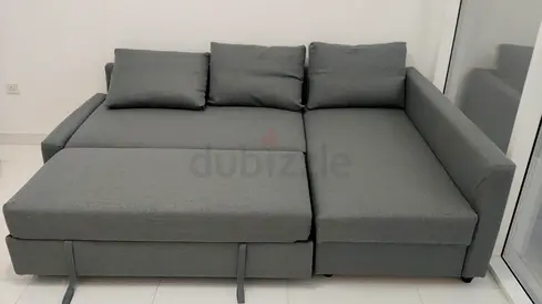 Grey L-shaped Sofa Bed with Storage - Good Condition