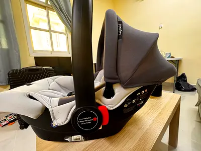 Used infant car seat (rear-facing) with canopy - good condition