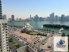 Beautiful two-bedroom apartment with a living room, balcony, and open view in Al Majaz 2. Spacious a