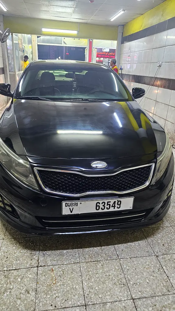 Kia Optima 2015 — photo 1 of 4