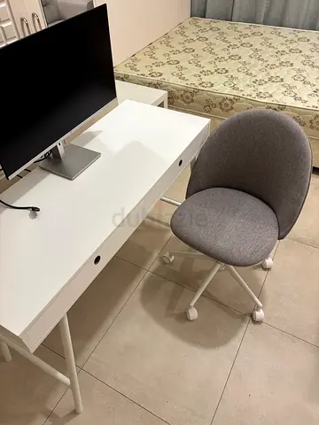 Brand new stylish workstation station: table chair and monitor