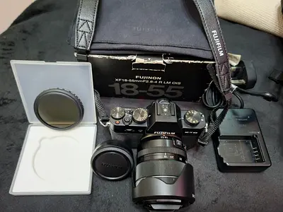 Fujifilm X-T10 with XF 18-55mm Kit + Extras (charger, caps, strap,)