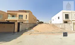 Residential land for villas for sale in Al Alia, 400 square meters, on a street and alley, priced at